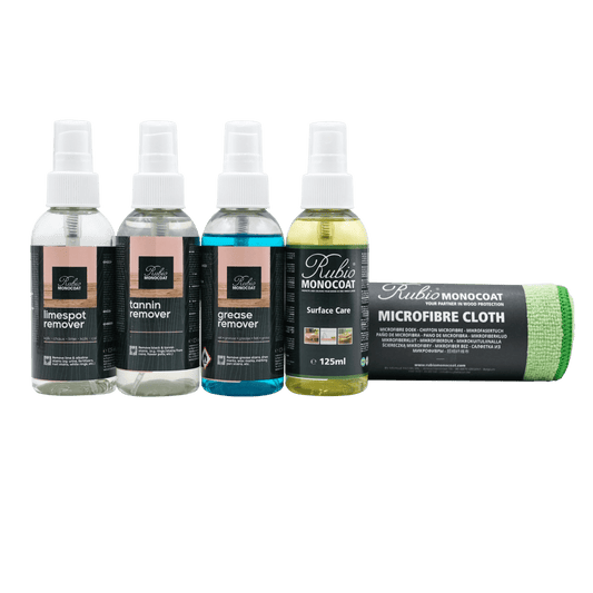 Set of Rubio Monocoat cleaning products including bottles and a microfiber cloth.